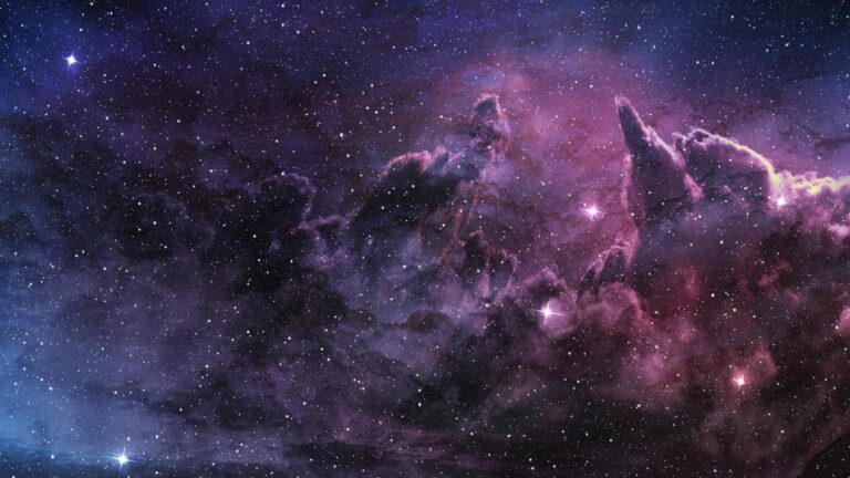 A starry night sky featuring a vibrant nebula with shades of blue, purple, and pink, interspersed with bright stars and cosmic dust.