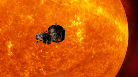 A satellite orbits closely around a vivid, fiery representation of the sun, capturing data or imagery.