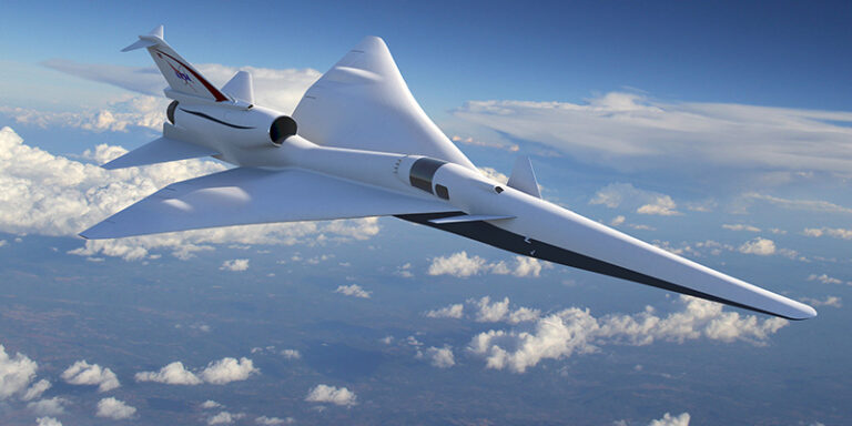 A sleek, white supersonic jet flies above the clouds, exhibiting a futuristic design with elongated wings and a sharp nose.