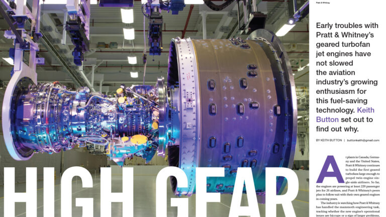 A large jet engine is suspended in an industrial setting. The engine's intricate parts and cables are visible. Text discusses aviation industry interest in fuel-saving geared turbofan jet engines.