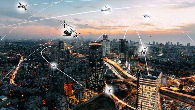 An aerial view of a city at dusk with multiple drones and helicopters flying above, connected by white lines depicting communication or flight paths, illuminating the skyline with their lights.