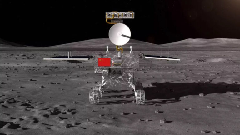 A robotic lunar rover with a large satellite dish, solar panels, and a red national flag moves across the rocky lunar surface.