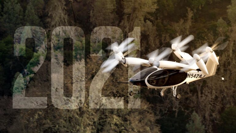An aircraft with multiple propellers flying above a forest with "2021" in large, semi-transparent numbers overlaying the image.