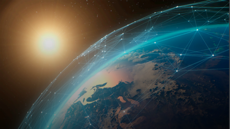 A view of Earth from space, featuring a glowing sun in the backdrop and a network of interconnected lines around the planet illustrating global connections or communication networks.