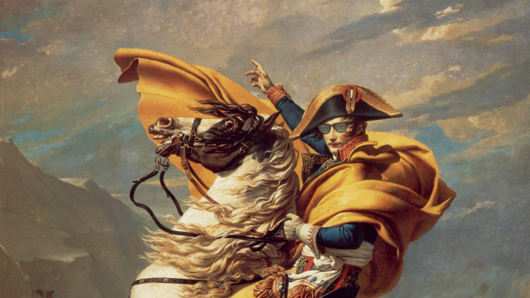 A person wearing sunglasses and a historical military uniform is riding a rearing horse against a mountainous background.