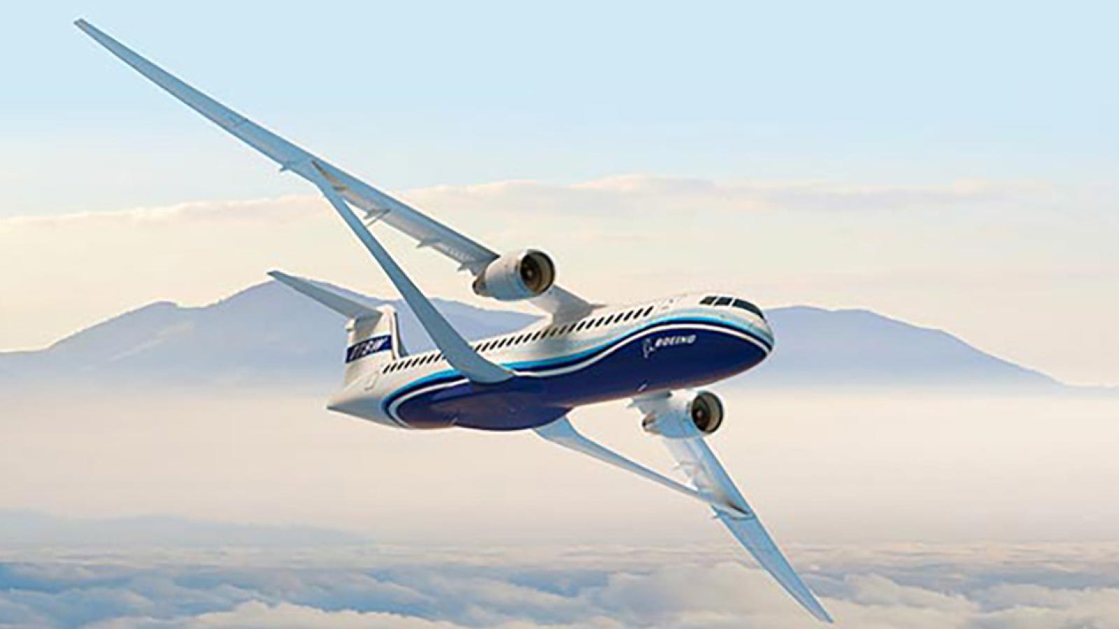 A twin-engine Boeing airplane with distinctive angled wings flies in the sky above a layer of clouds, with mountain peaks visible in the background.