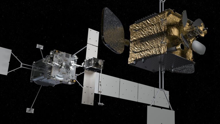 Two satellites in space conducting a rendezvous operation; one features a gold-colored surface and the other has an extended solar array.