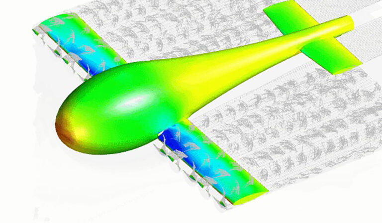 Flow simulation of a conceptual aircraft design, showing a color-coded aerodynamic analysis with green, yellow, and blue gradients indicating various airflow characteristics over the aircraft's body and wings.