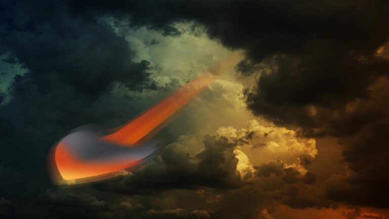 A meteor streaks through a cloudy sky, emitting a bright orange glow contrasting against dark, stormy clouds.