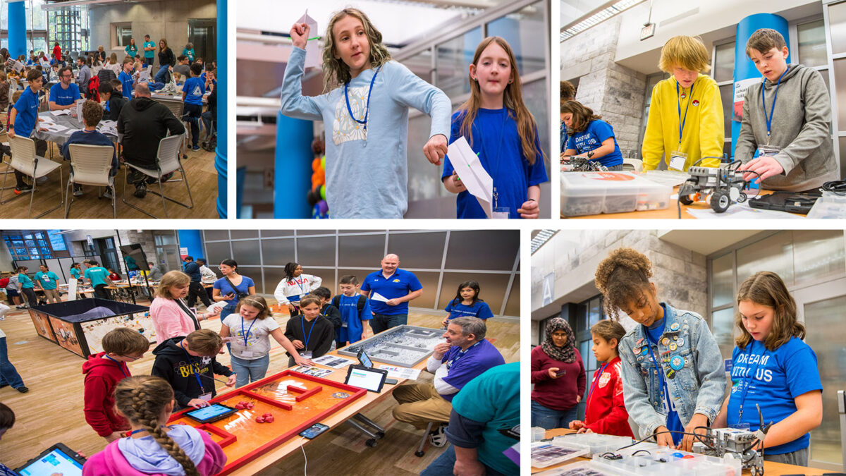 Children participating in a robotics workshop, assembling robots and interacting with technology at various stations in a large room.