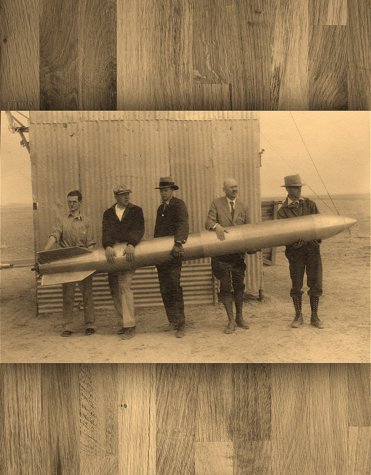 Goddard (second from right) maintained a small team for his rocketry work. This model flew in April 1932.