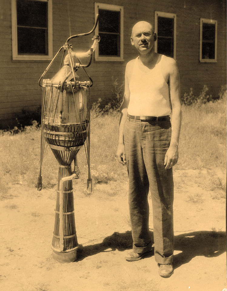 Goddard poses with a 12-inch-diameter rocket motor in 1932 in Roswell, New Mexico.